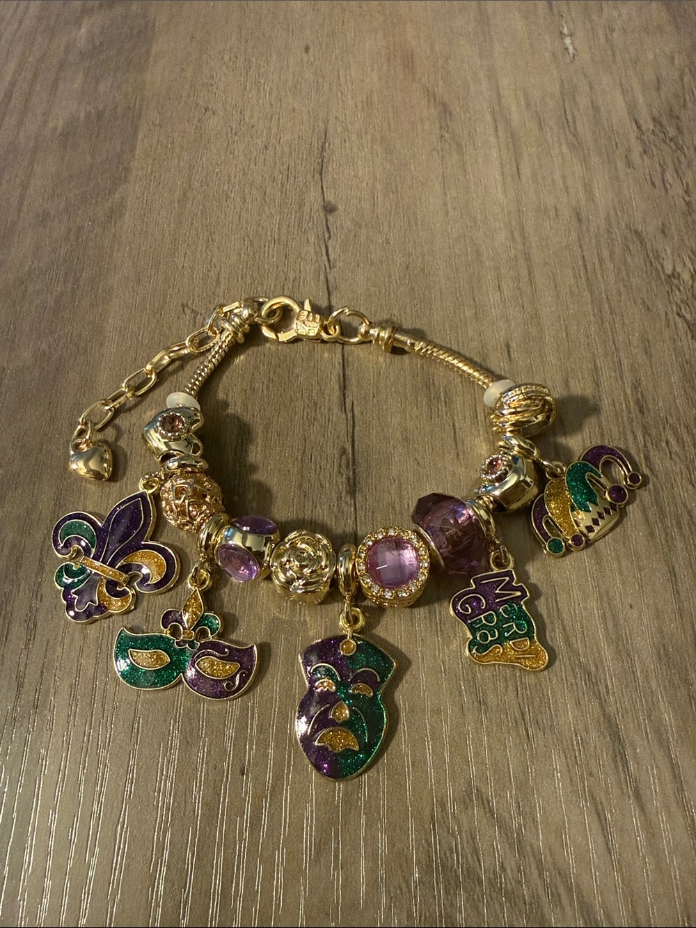 Gold-Tone Mardi Gras Charm Bracelet with Purple and Green Enamel